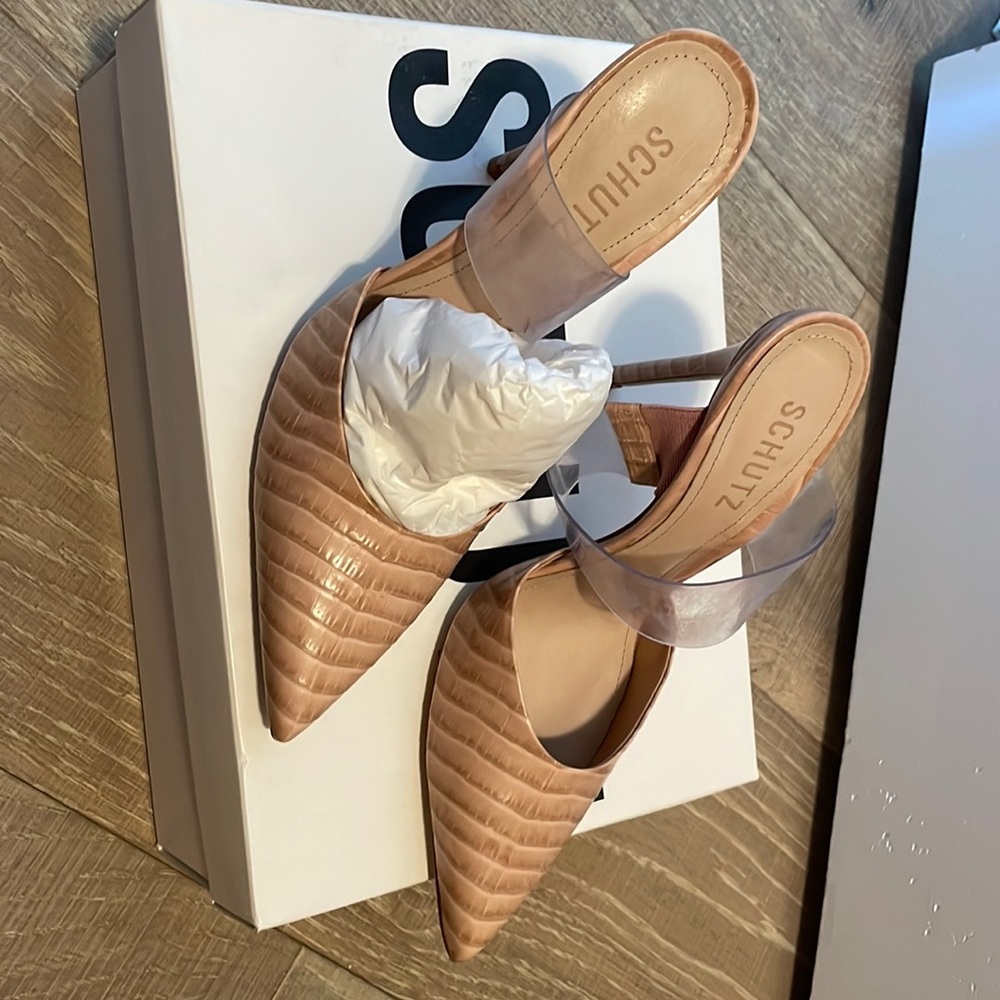 Heels, new in box.